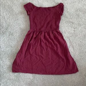 a maroon dress.